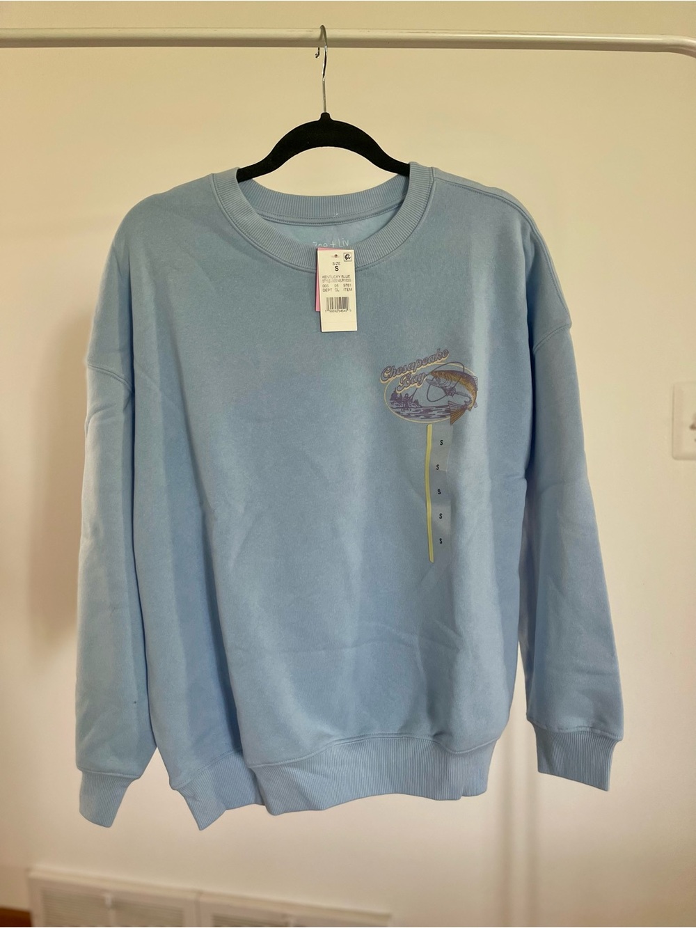 Zoe + Liv Light Blue Crewneck Sweatshirt with Subtle Chest Graphic